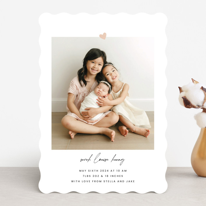 scalloped edge white card stock birth announcement, featuring siblings with baby